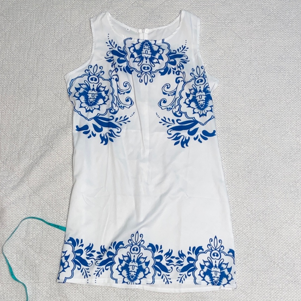 White Sleeveless Dress with Blue Floral Medallions